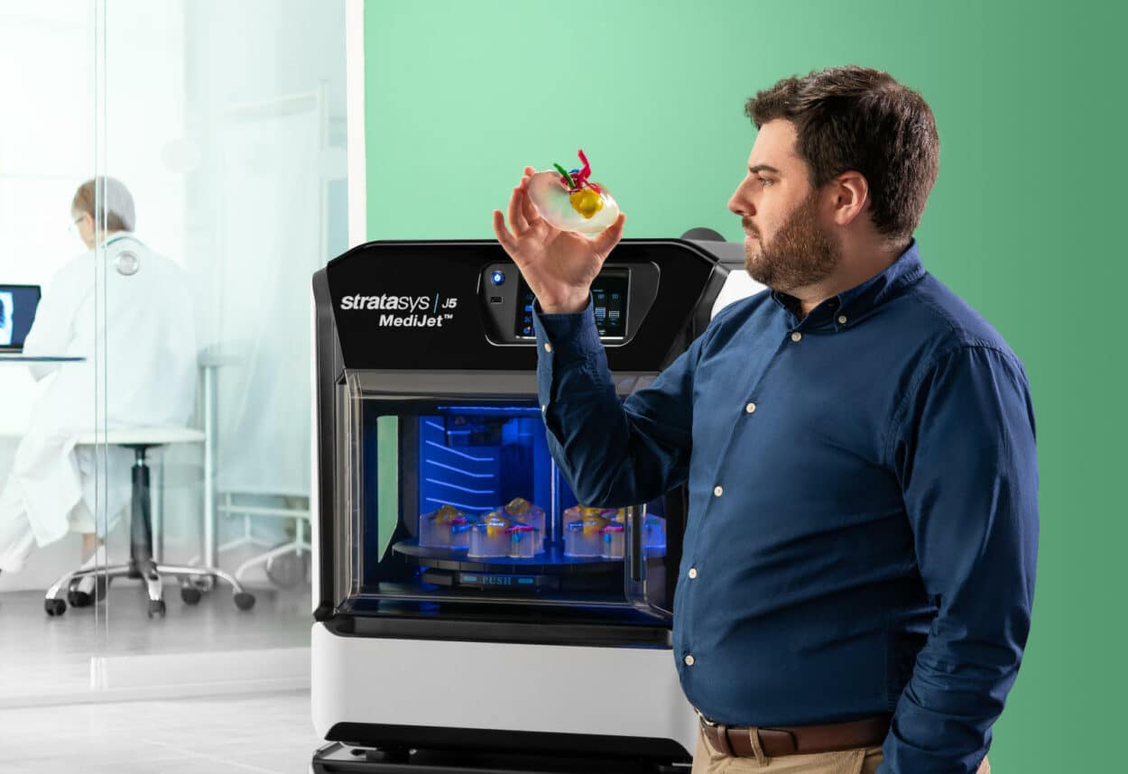 stratasys-j5-medijet-1250x858-1 The Stratasys’ J5 MediJet 3D Printer is the first and only device that can produce anatomical models with full color and the accurate texture needed for pre-surgery planning. (Credit: Stratasys)